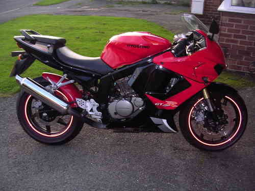 hyosung gt250r fitted with reflective red rim tapes