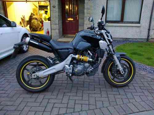 yamaha mt-08 fitted with bright yellow named rim tapes